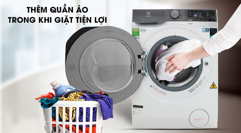 Thêm quần áo khi máy đang giặt